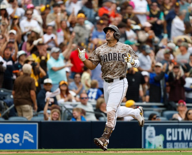Ramón Laureano #5 of the San Diego Padres rounds the bases after hitting a two-run home run in the sixth inning against the Colorado Rockies at Petco Park on April 12, 2026 in San Diego, CA. (K.C. Alfred / The San Diego Union-Tribune)