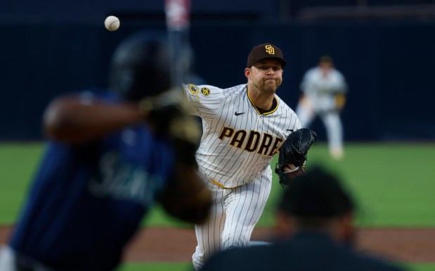 Michael King of the San Diego Padres pitches to Randy Arozarena #56 of the Seattle Mariners at Petco Park on April 14, 2026 in San Diego, CA. (K.C. Alfred / The San Diego Union-Tribune)