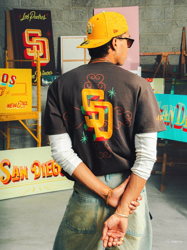 Mexican artist Giovanni Bautista, who leads the Rótulos Bautista workshop, designed Padres shirts and hats for the Mexico City Series. (Photo courtesy of New Era)