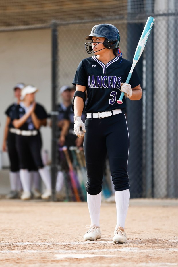 Carlsbad High School center fielder Gabriela Nevarez before batting against Del Norte at Carlsbad High School on Friday, April 3, 2026 in Carlsbad, California. (Meg McLaughlin / The San Diego Union-Tribune)