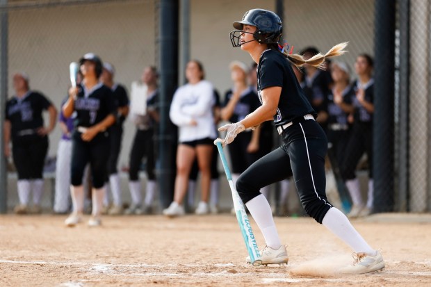 Carlsbad High School center fielder Gabriela Nevarez singles against Del Norte at Carlsbad High School on Friday, April 3, 2026 in Carlsbad, California. (Meg McLaughlin / The San Diego Union-Tribune)