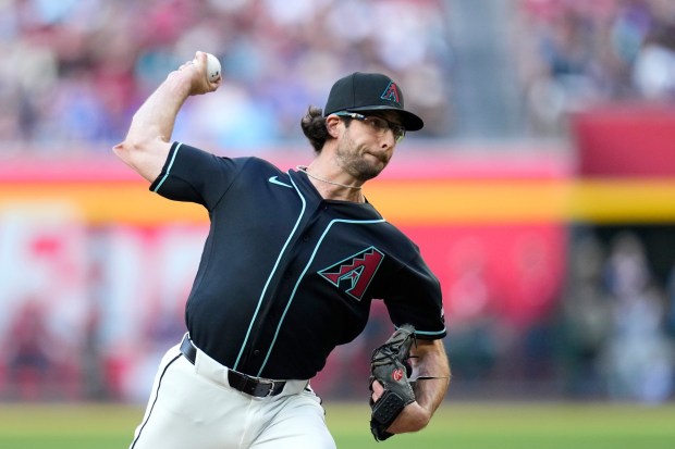 Arizona Diamondbacks starting pitcher Zac Gallen throws against the Toronto Blue Jays during the first inning of a baseball game, Saturday, April 18, 2026, in Phoenix. (AP Photo/Ross D. Franklin)