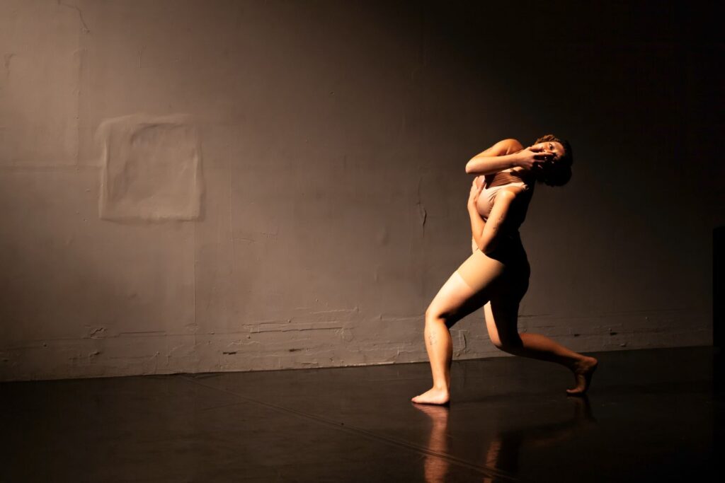 "La Paralisis del Sueño" choreographed by Santiago Rivera - Dancer: Alondra Zitlaly Perez - Photo by Denise Leitner.