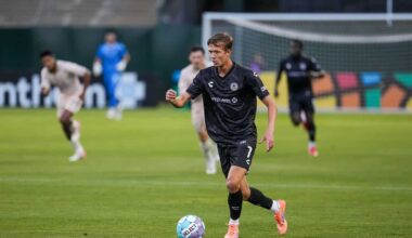 Alameda Post - An Oakland Roots player dribbles the ball in a match against FC Tulsa.