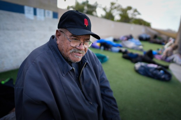 Lauro Mendoza, who has been homeless for the past four years, takes advantage of having his mail delivered to the center. (Nelvin C. Cepeda / The San Diego Union-Tribune)