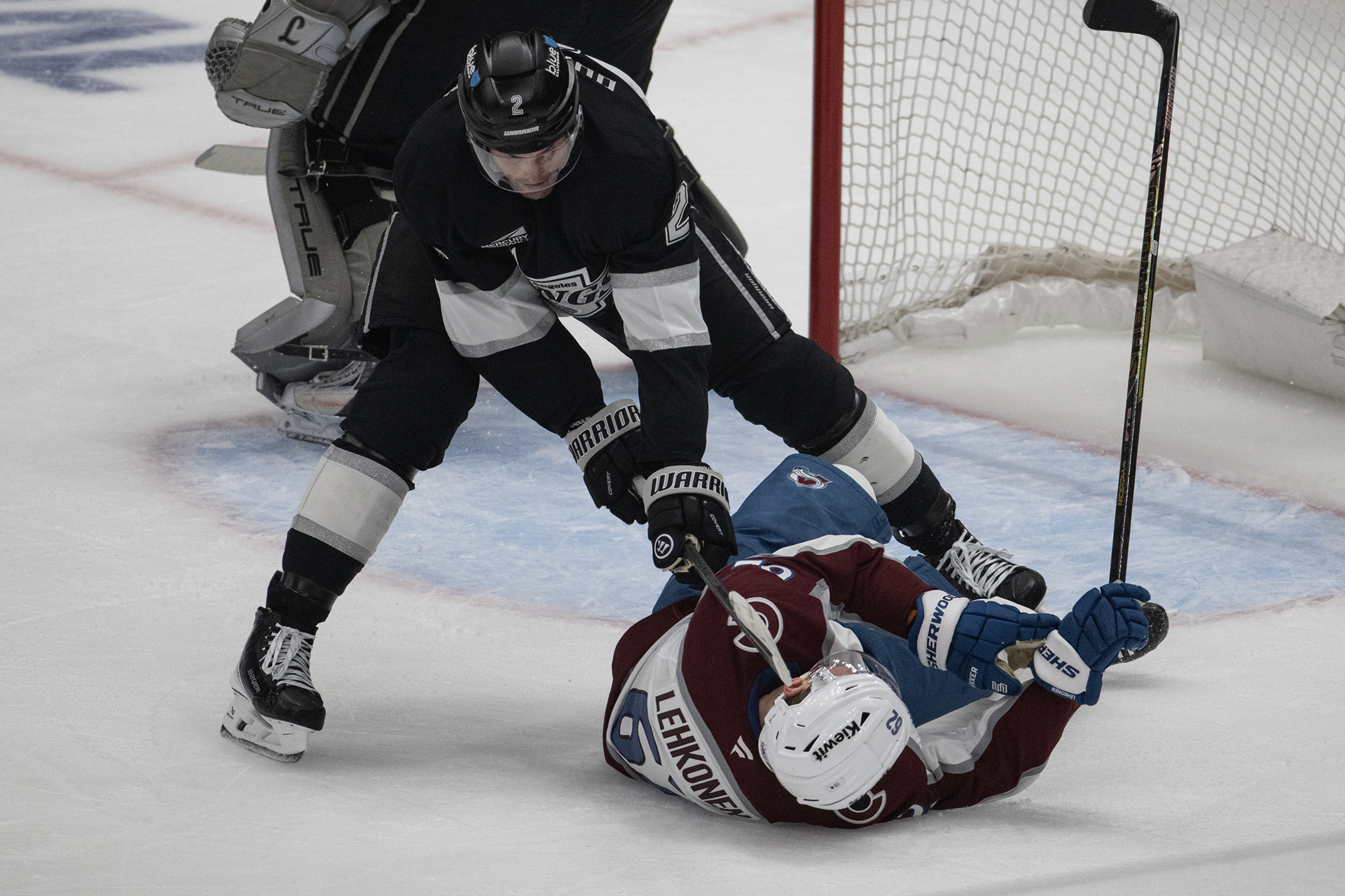 Defenseman Brian Dumoulin (2) of the Los Angeles Kings takes...