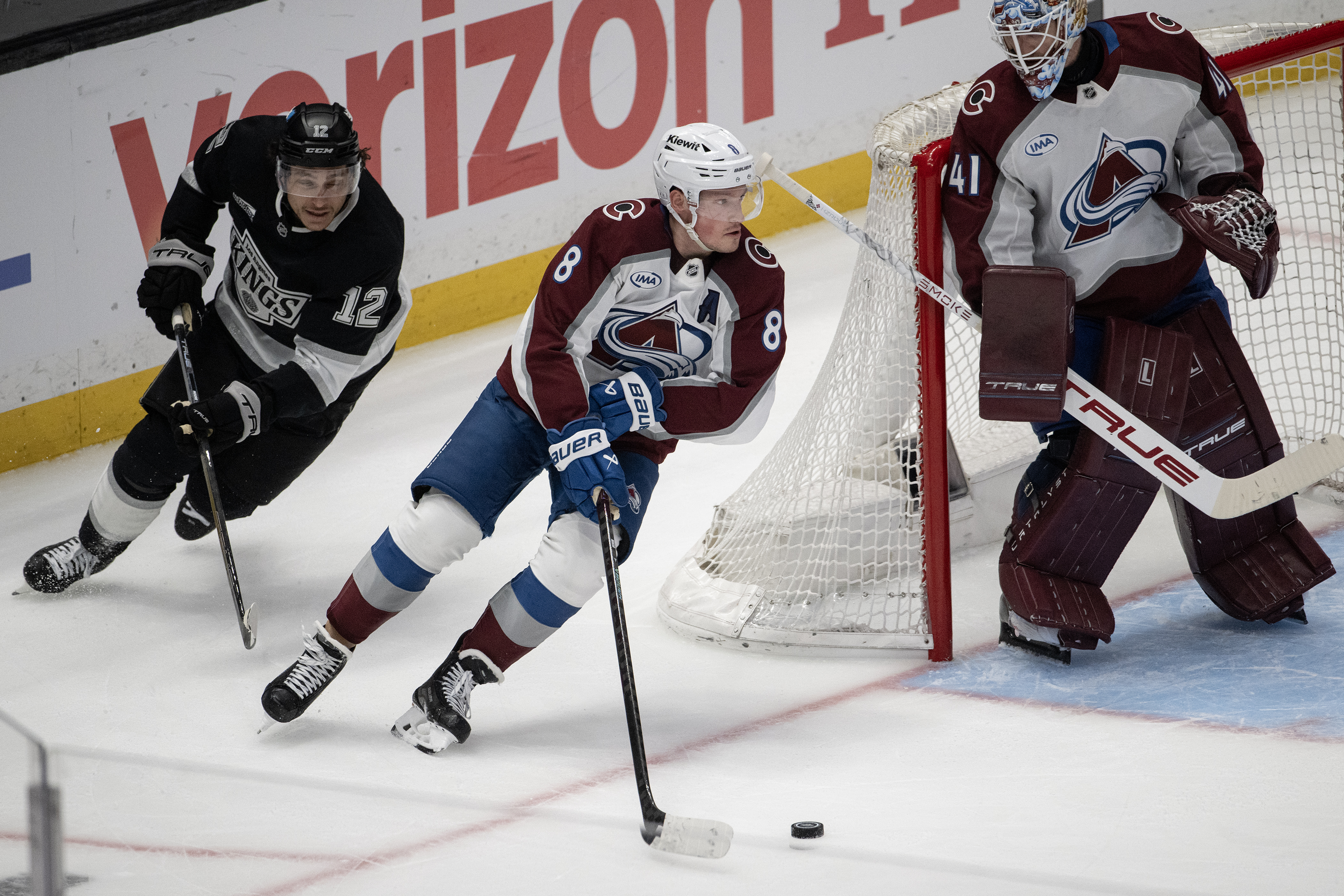 Defenseman Cale Makar (8) of the Colorado Avalanche outpaces left...