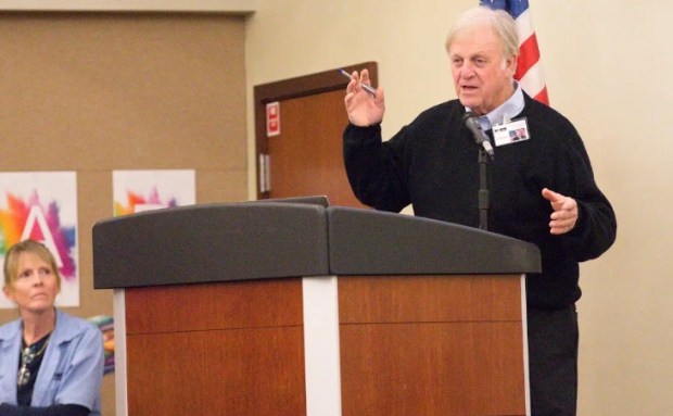 Macomb Intermediate School District Superintendent Mike DeVault offers remarks to educators, authors and young readers at Saturday's event. (GEORGE SPITERI--For The Macomb Daily)
