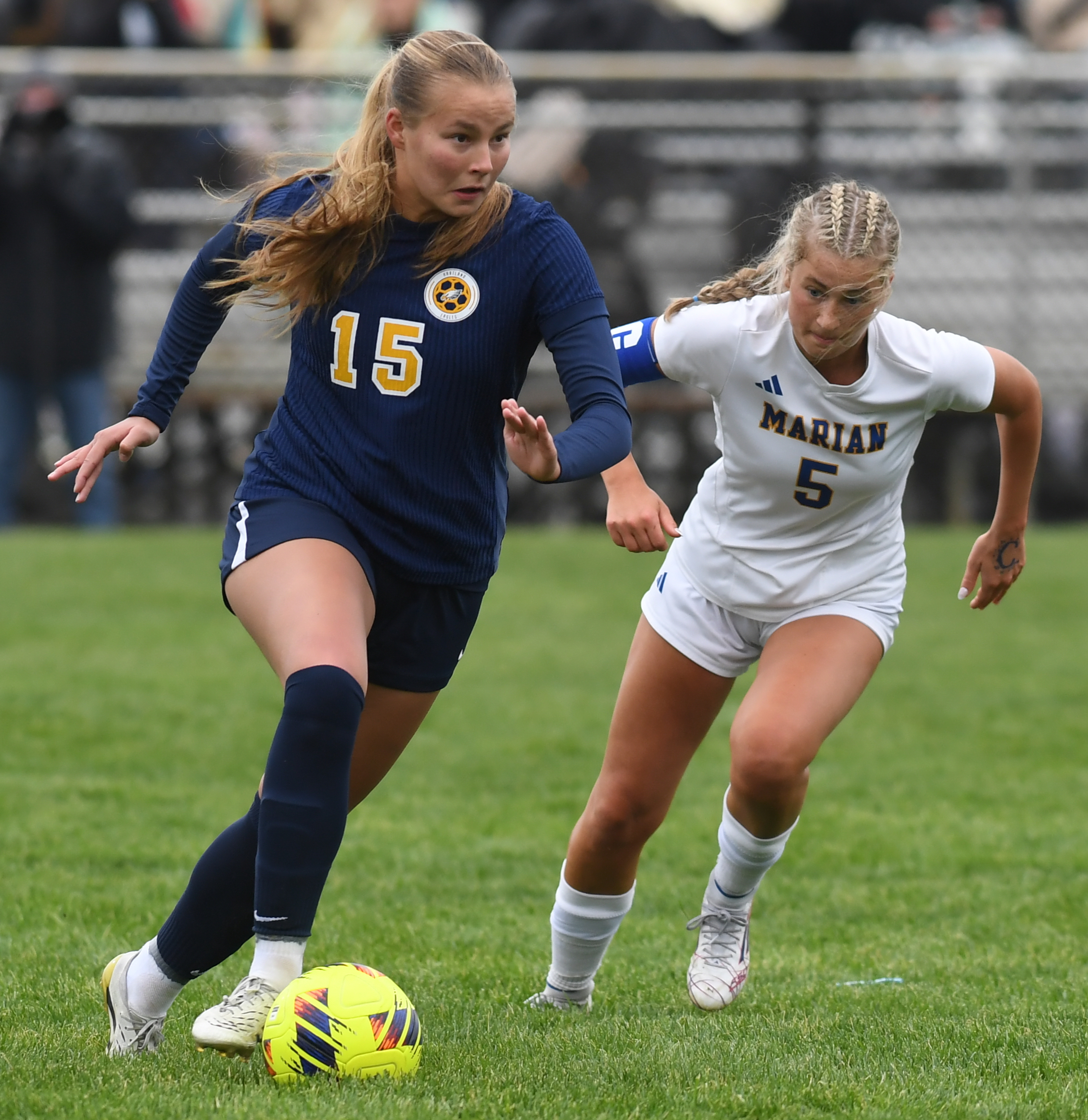 Hartland's Claire L'Esperance (15) controls the ball in front of...
