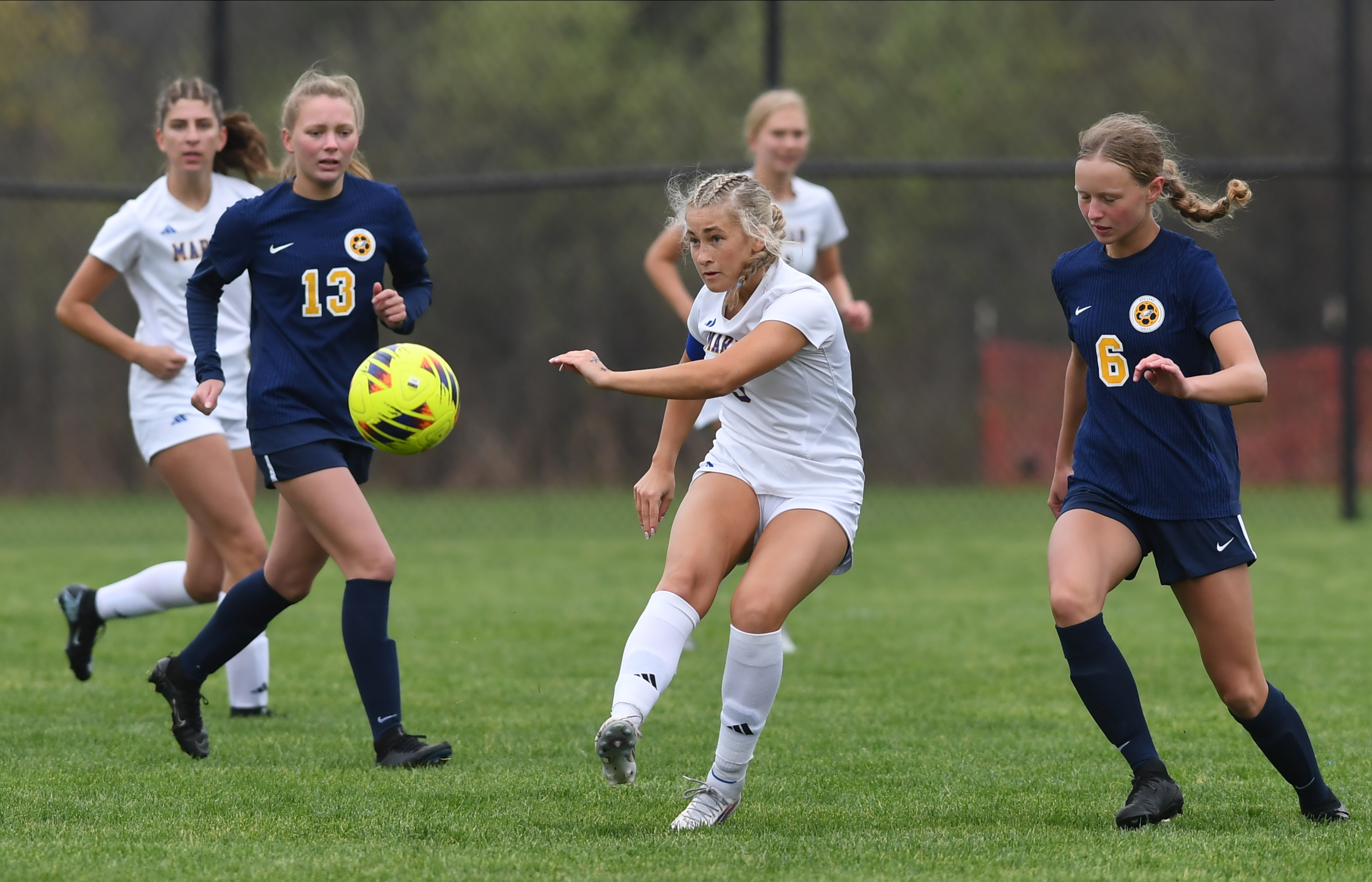 The Bloomfield Hills Marian Mustangs defeated the Hartland Eagles 3-2...