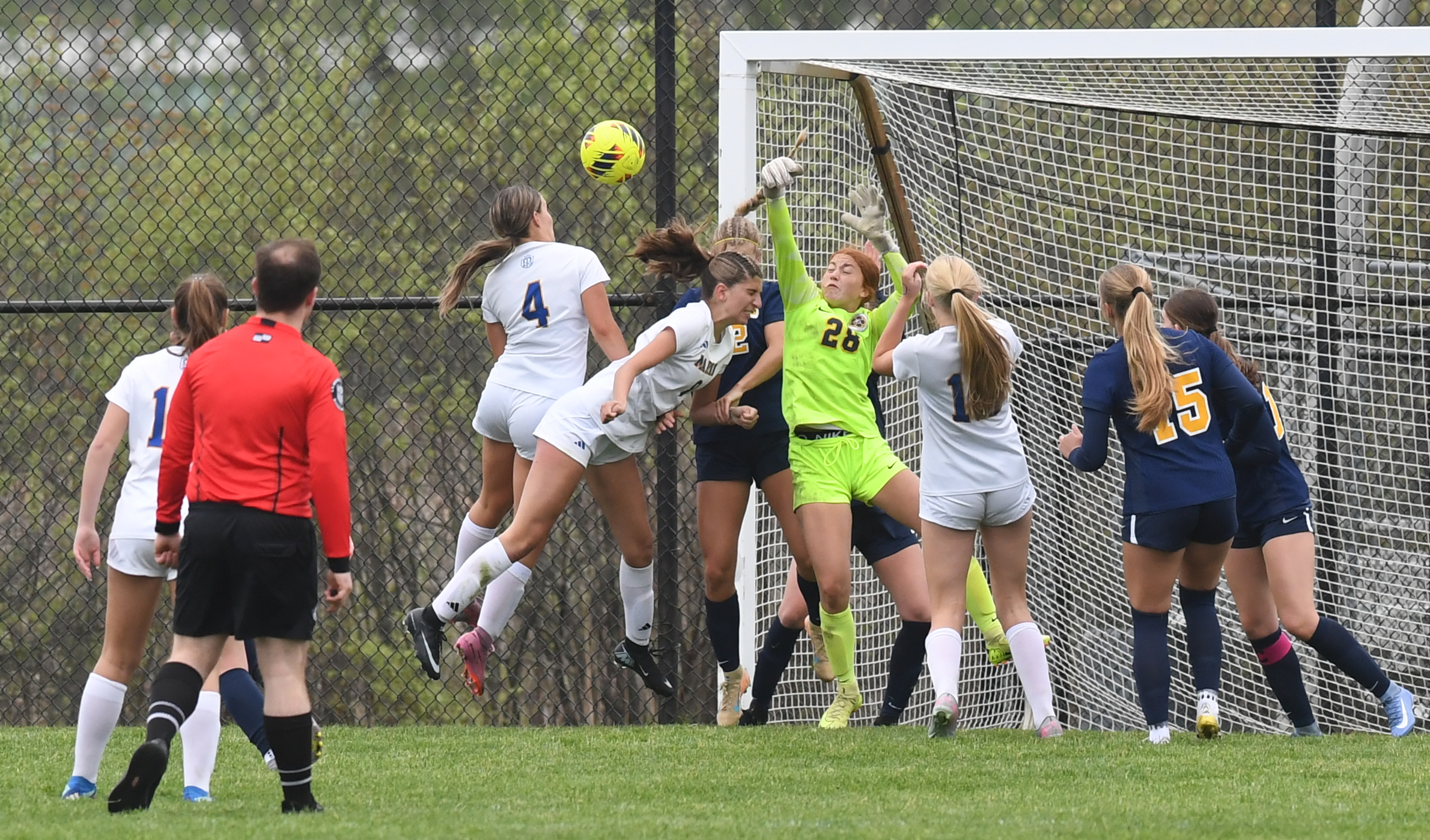 The Bloomfield Hills Marian Mustangs defeated the Hartland Eagles 3-2...