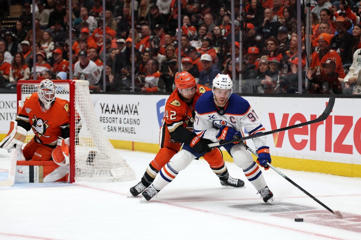Tim Washe of the Anaheim Ducks Pressures Connor McDavid Edmonton Oilers