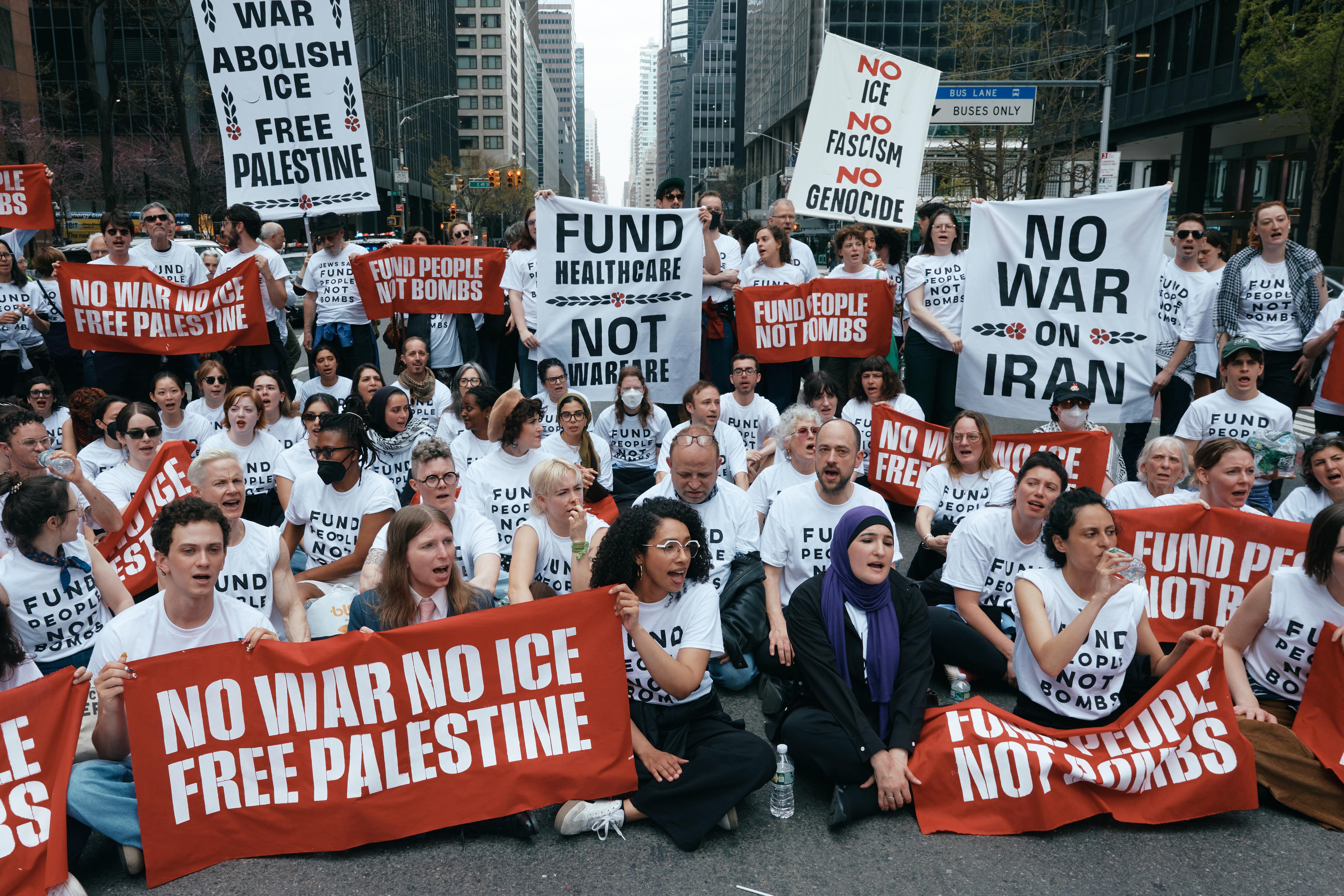 Chelsea Manning, bottom second left, and protesters with Jewish Voice...