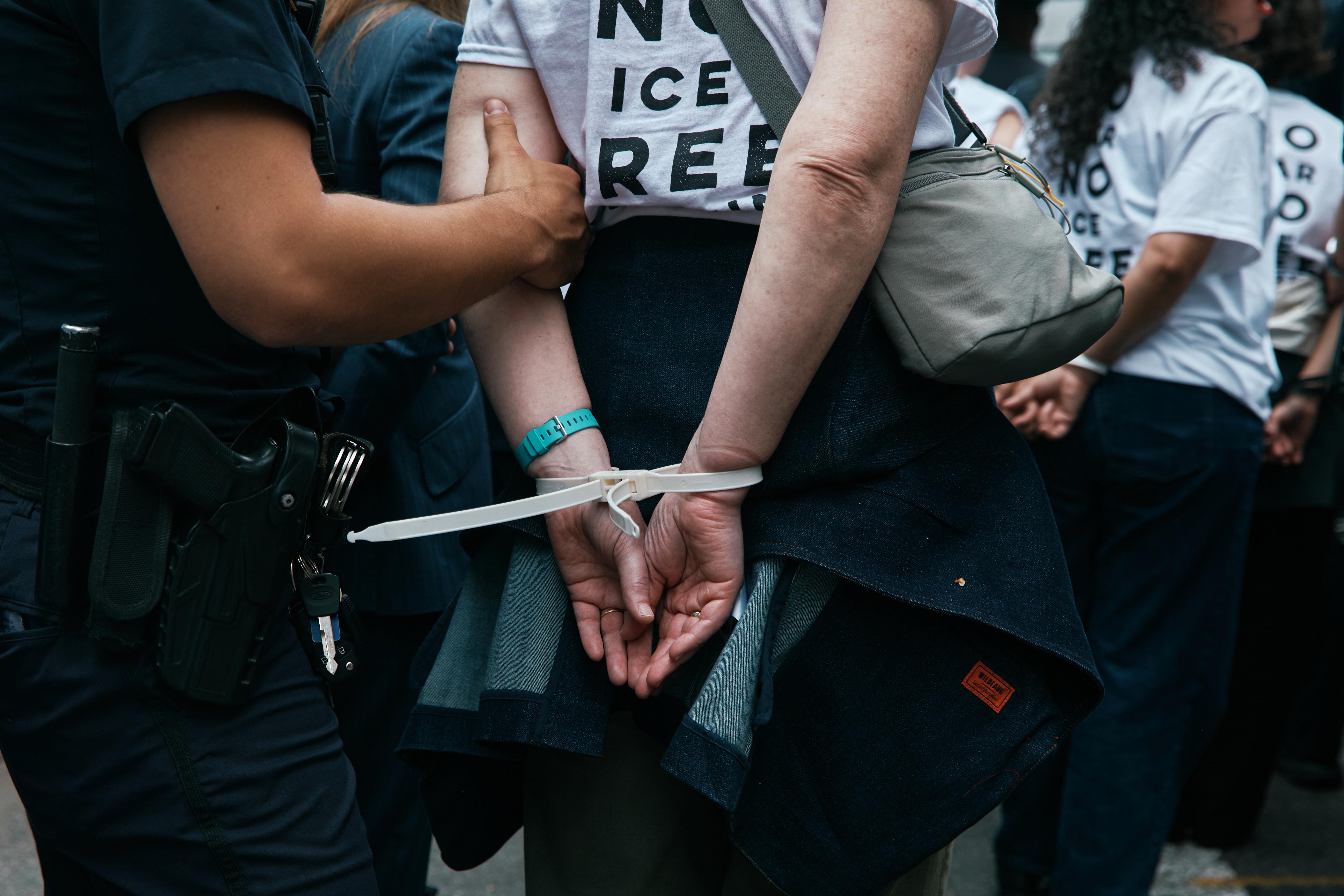 Protesters with Jewish Voice for Peace get arrested after blocking...
