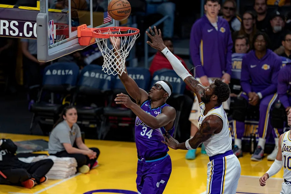 Utah Jazz forward Oscar Tshiebwe (34) performs a lay up during an NBA basketball game against the Los Angeles Lakers on April 12th, 2026 in Los Angeles, CA.