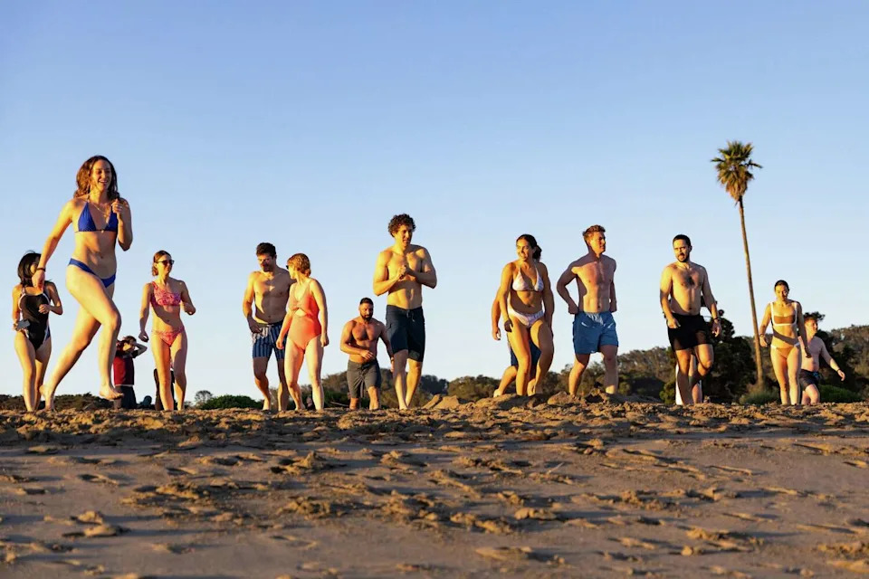 Members of the Salty Dogs Club San Francisco head into the water at around 7 a.m., then typically drink coffee or warm up in a portable sauna. (Jana Ašenbrennerová/For the S.F. Chronicle)