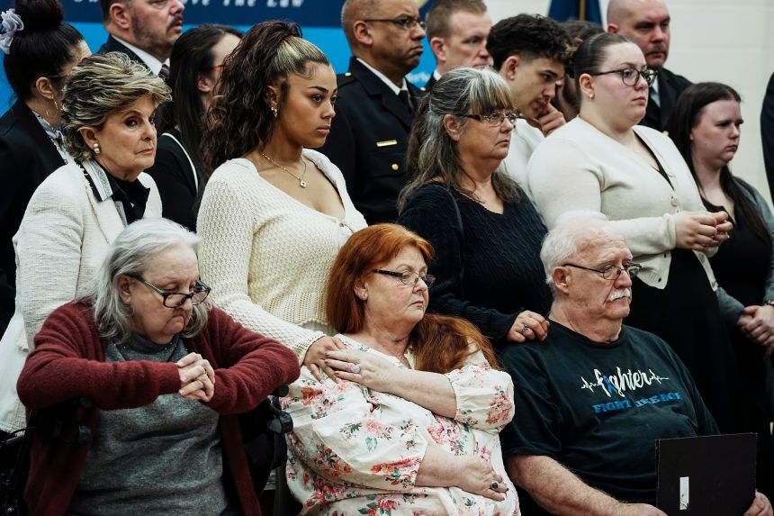 Family members of the victims react as they listen to Suffolk County District Attorney Ray Tierney during a news conference after Rex Heuermann pleaded guilty on Wednesday.