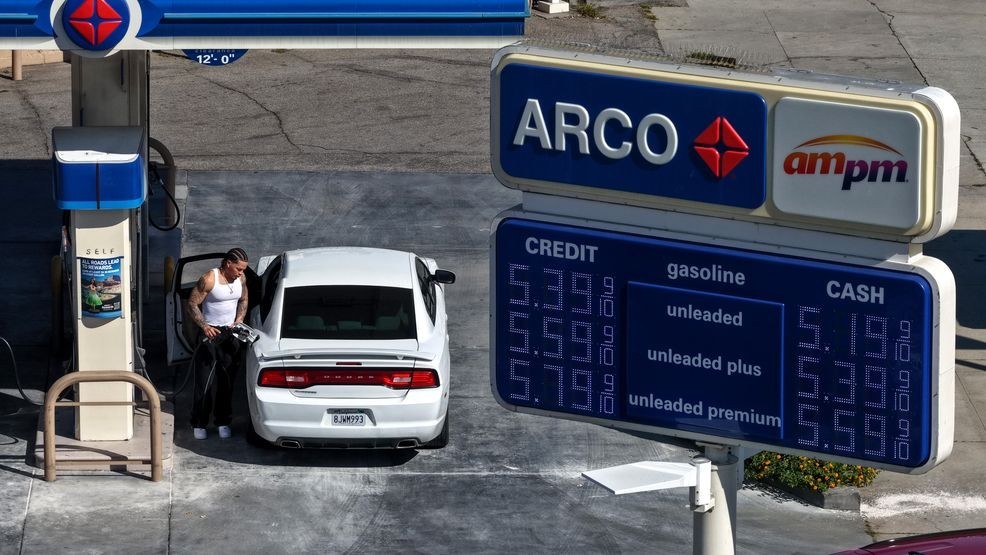 In an aerial view, a customer pumps gas into his car at an Arco station with gas prices over $5 a gallon on March 11, 2026 in Los Angeles, California. (Photo by Justin Sullivan/Getty Images)