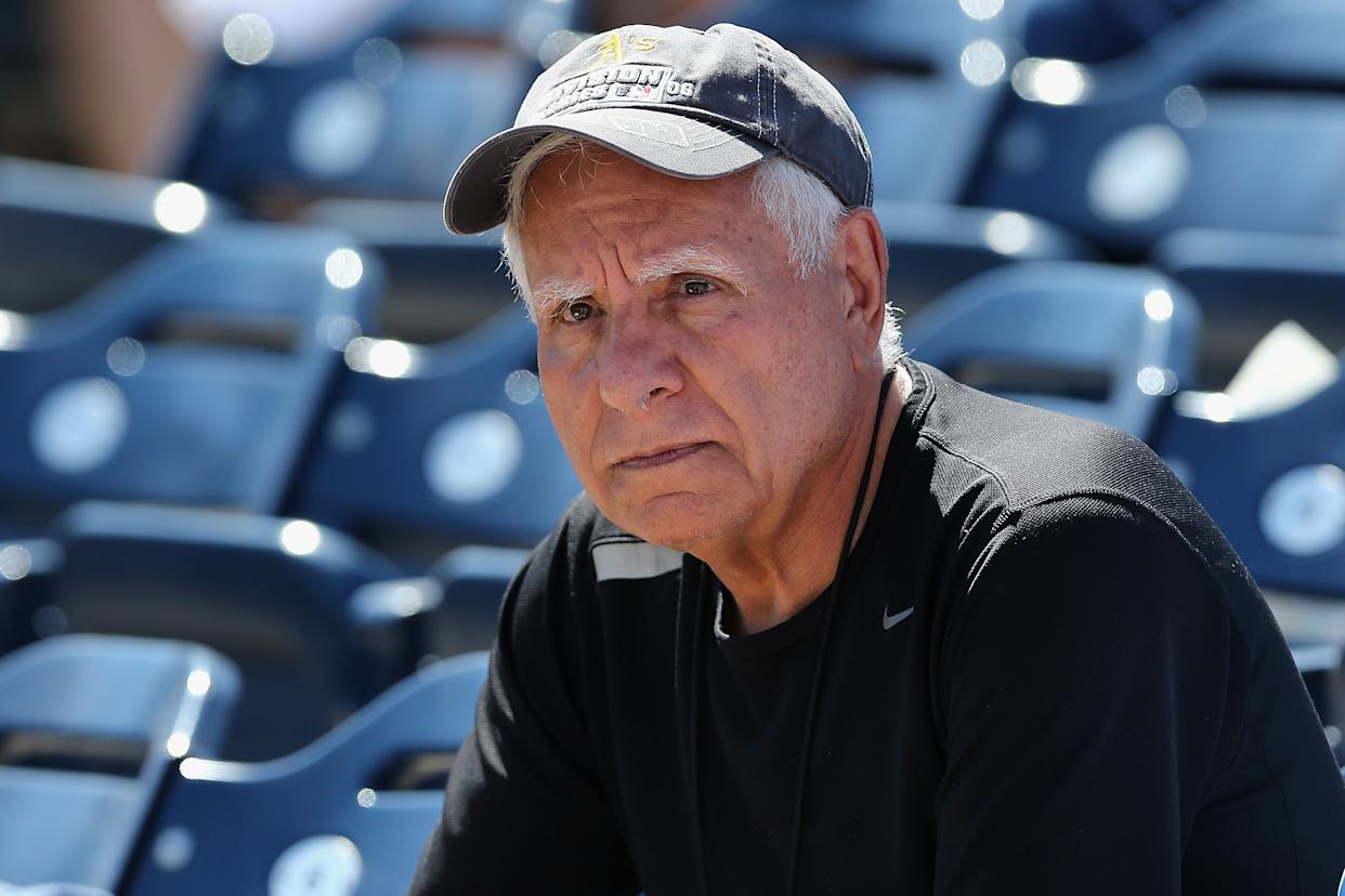 Owner of the Oakland Athletics, Lew Wolff attends the spring training game against the San Diego Padres at Peoria Stadium on March 11, 2014 in Peoria, Arizona.