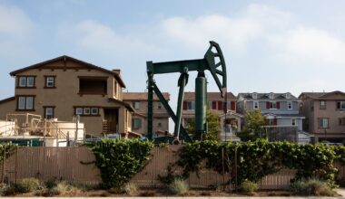 Signal Hill, an affluent suburb of Long Beach, features dozens of active oil wells and derricks around the town many in commercial parking lots and residential areas only feet from homes.