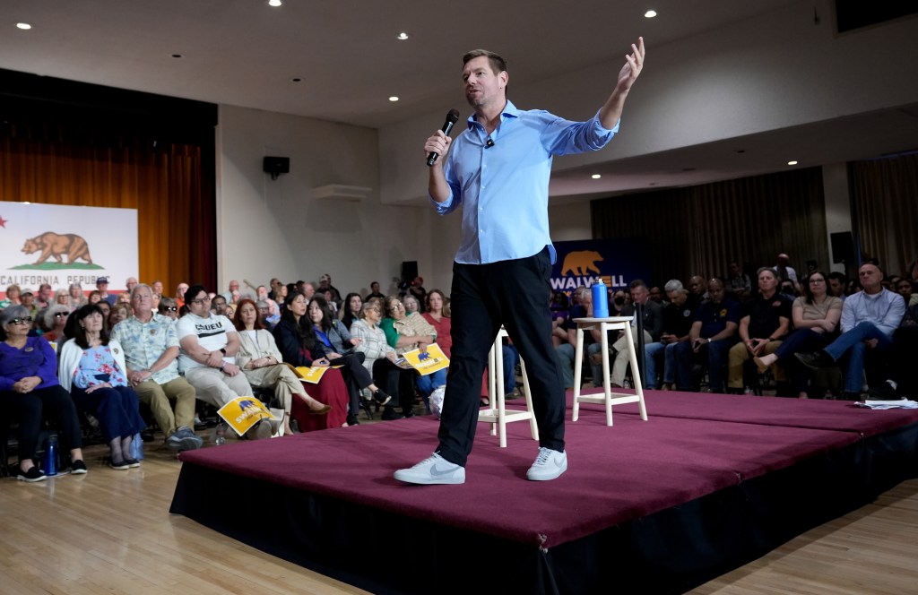 Rep. Eric Swalwell speaking at a town hall meeting in Sacramento.
