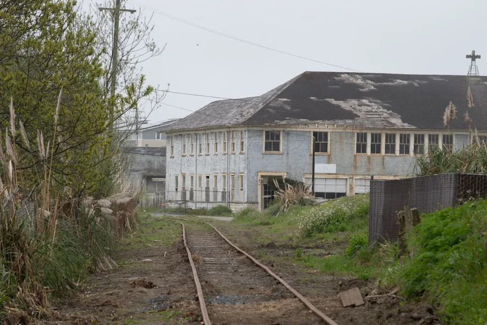 Railroad tracks lead toward the historic Samoa Fire Station, near where they are proposing to build wind turbines.
