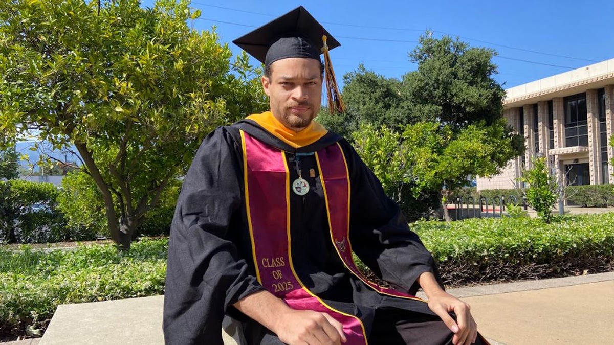 Cole Allen in graduation gown