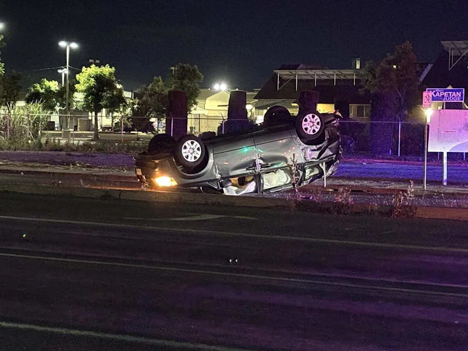A minivan rolled over due to a crash involving a Fresno police vehicle on Tuesday night.