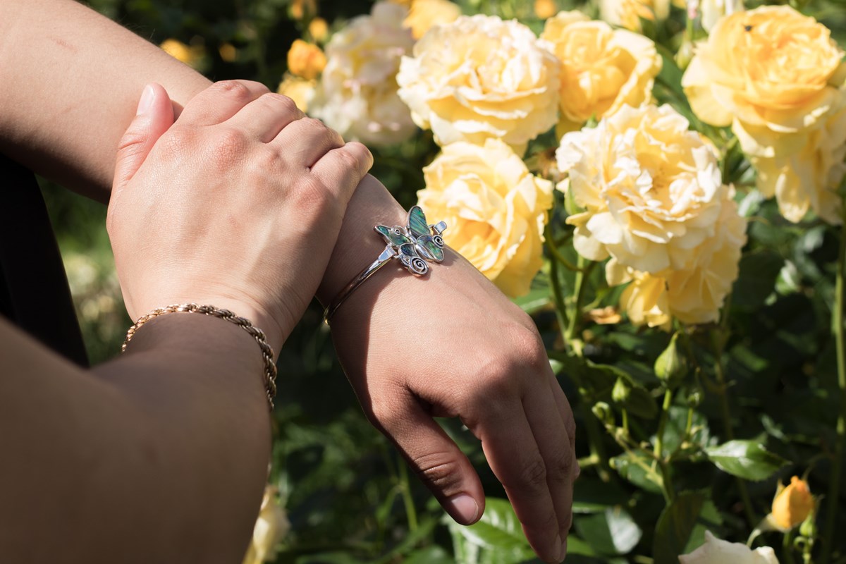 A butterfly bracelet on Valladares’ wrist Monday, April 13, 2026, in East Sacramento. She says the bracelet is a symbol for DACA and reminds her of who she represents.