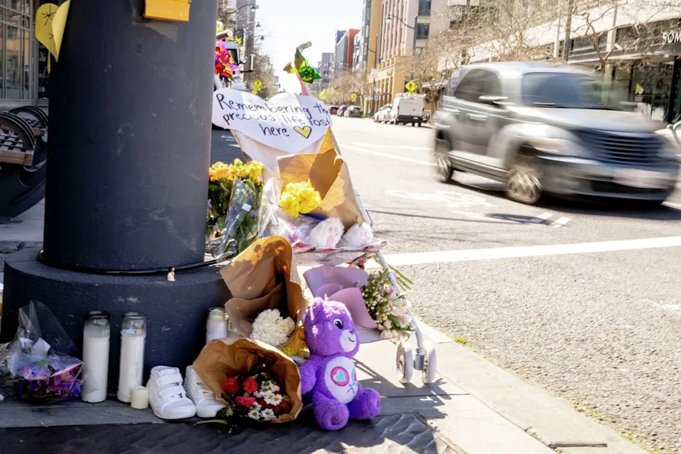 A memorial sat in March at the corner of Fourth and Channel street where a 2-year-old was fatally struck by a vehicle while crossing the intersection with a parent in February. (Stephen Lam/S.F. Chronicle)
