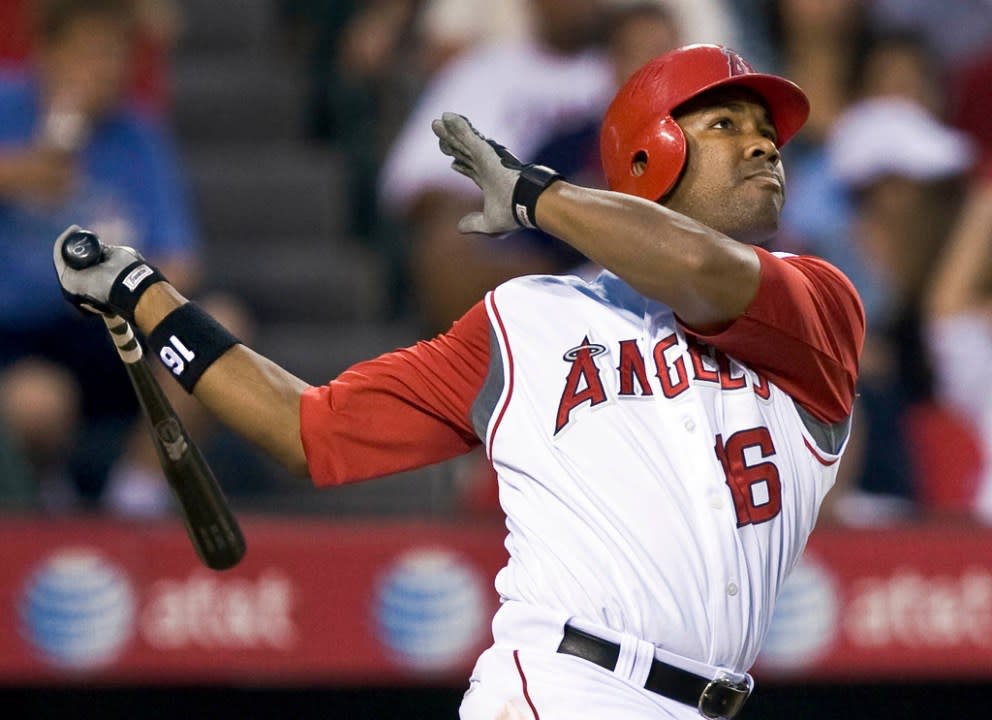 FILE – Los Angeles Angels’ Garret Anderson watches the ball after hitting a two-run homer against the Toronto Blue Jays in the seventh inning of a baseball game in Anaheim, Calif., Friday, July 4, 2008. (AP Photo/Mark Avery, File)