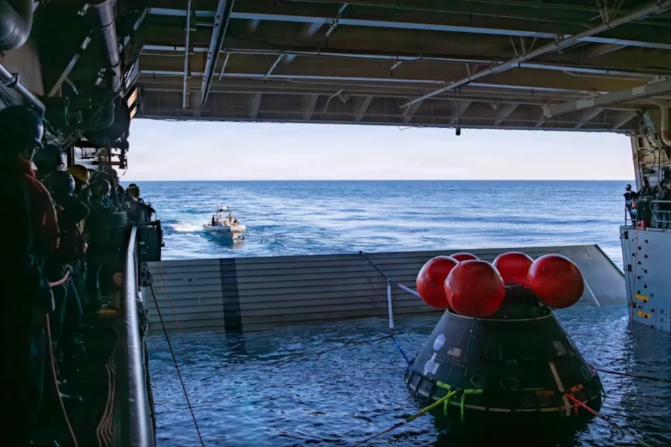 260126-N-DB724-1027 Sailors assigned to amphibious transport dock ship USS John P. Murtha (LPD 26) and NASA engineers prepare to release a crew module test article from the ship’s well deck, Jan. 26, 2026. John P. Murtha is underway in the U.S. 3rd Fleet area of operations performing a just-in-time training in support of U.S. Space Command's human space flight recovery mission to retrieve NASA’s Artemis II crew and spacecraft following their splashdown in the Pacific Ocean. U.S. 3rd Fleet, an integral part of the U.S. Pacific Fleet, leads naval forces in the Indo-Pacific and provides the realistic, relevant training necessary to execute our Navy’s role across the full spectrum of military operations—from combat operations to humanitarian assistance and disaster response. U.S. 3rd Fleet works together with allies and partners to advance freedom of navigation, the rule of law, and other principles that underpin security for the Indo-Pacific region. (U.S. Navy photo by Mass Communication Specialist 1st Class Jomark A. Almazan)

