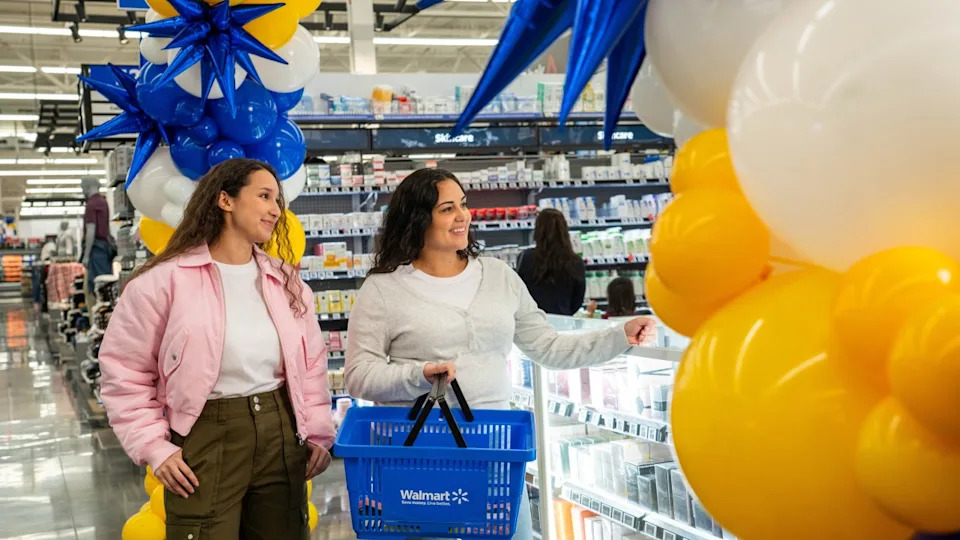 Two women shopping in the Walmart’s cosmetics aisle. (Credit: Walmart)