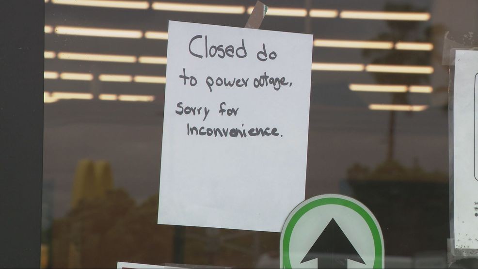 The Albertsons on Brundage Lane is closed, with signs on the window saying it was due to an inspection grade by Kern County Public Health and a power outage. PHOTO: KBAK/KBFX