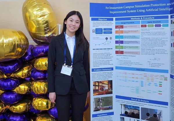 Bishop's School student Ella Xing shows a display about her award-winning emergency simulation project at the 2025 Greater San Diego Science & Engineering Fair. (Peilin Fu)