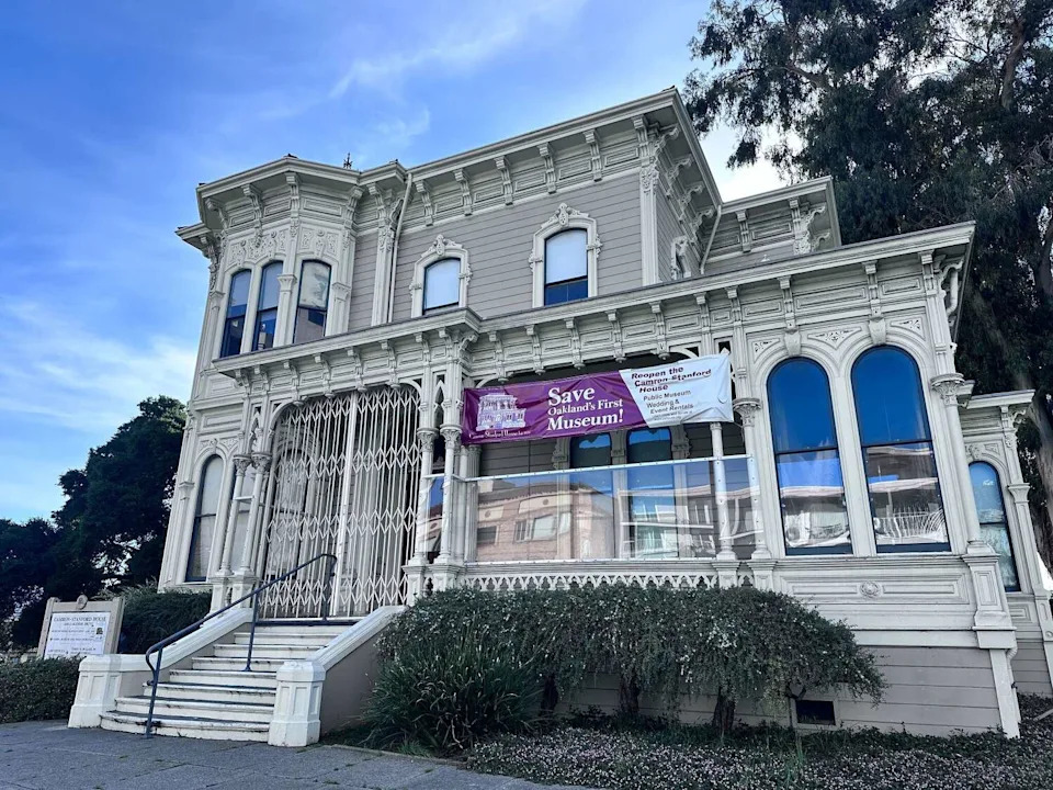 The front of the historic Camron-Stanford House in Oakland largely escaped damage from Saturday's fire, which affected another part of the building. (Sarah Feldberg/S.F. Chronicle)