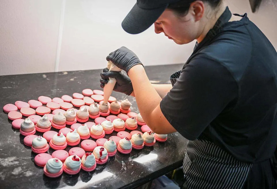 Macarons are prepared in the kitchen at Lodéi Bakery & Cafe, an Armenian family-owned bakery on the northeast corner of Palm and Bullard avenues.