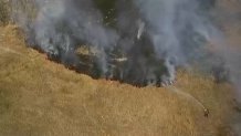 A brush fire in Oceanside on April 24, 2026.