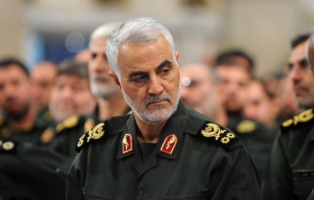Qassem Soleimani in uniform with military insignia.