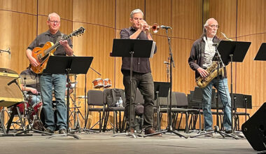 three BC Jazz faculty performing on stage during the event