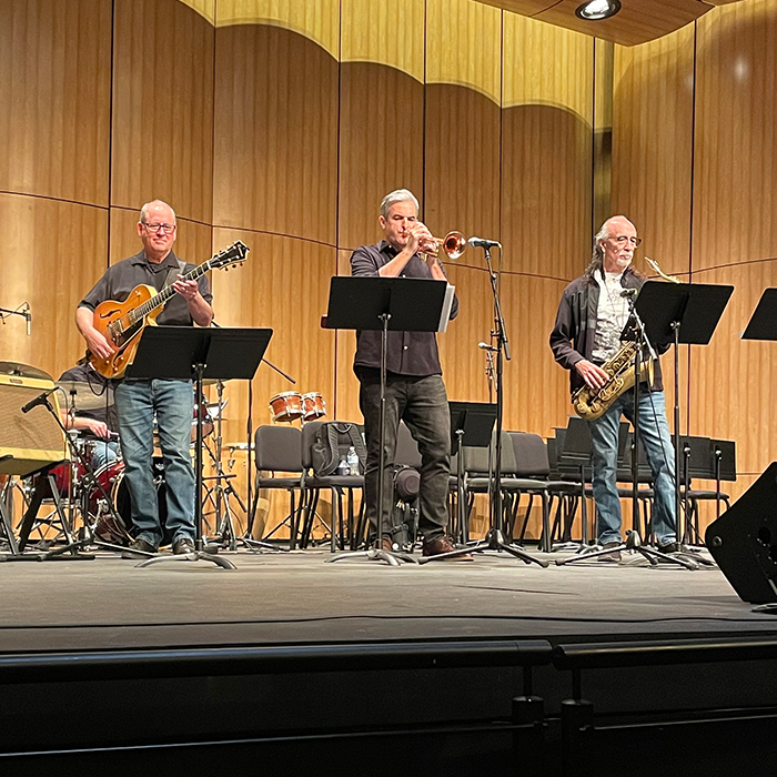 three BC Jazz faculty performing on stage during the event