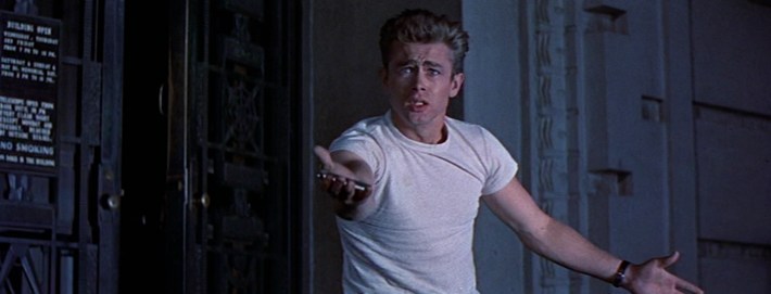 a man holding a clip from a gun