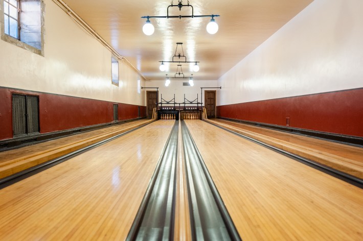 a bowling alley in a mansion