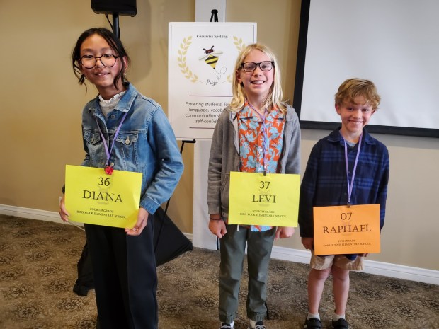 The top three spellers in the 2025 Coastwise Spelling Bee in the fourth- and fifth-grade division were winner Levi Pancer (center), a Bird Rock Elementary School fourth-grader, along with Bird Rock Elementary fourth-grader Diana Zhu and Torrey Pines Elementary School fifth-grader Raphael Gelber. (Ashley Mackin-Solomon)