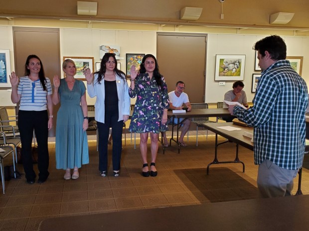 New La Jolla Village Merchants Association board members Kaity Rudolph, Sarah Putnam, Nicole Medina and Alysha Murillo are sworn in April 8. (Ashley Mackin-Solomon)