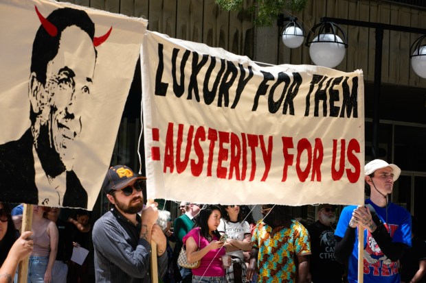 At the Civic Center Plaza on Monday, April 20, 2026, in San Diego, artists, musicians and supporters protest proposed budget cuts by Mayor Todd Gloria. (Nelvin C. Cepeda / The San Diego Union-Tribune)