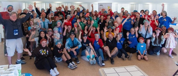 Volunteers pack thousands of meals