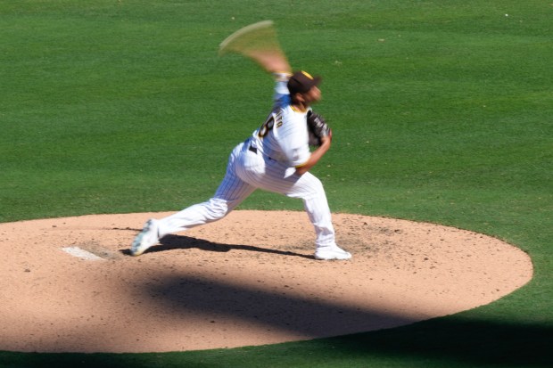 Wandy Peralta of the San Diego Padres pitches in the 9th inning against the Detroit Tigers during the Padres Opening Day at Petco Park on Thursday, March 26, 2026, in San Diego, CA.  (Nelvin C. Cepeda / The San Diego Union-Tribune)