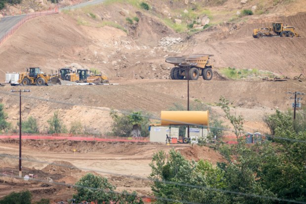 The Hidden Valley Ranch development, where 40 homes are planned for construction, is seen on Tuesday, March 31, 2026, in Poway. Jason Lavigne and Desiree Morales Whitman of the San Pasqual Band of Mission Indians speak about the artifacts that have been discovered and are stored on-site in a shipping container.