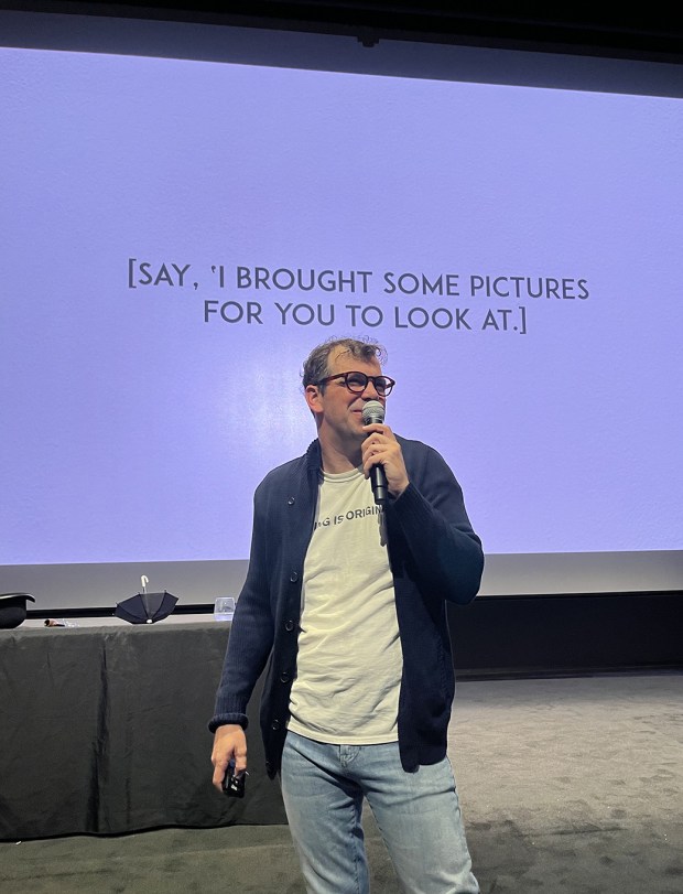 Drew Peterson presents the audience-interactive photo-themed piece "[IMAGE DESCRIPTION]" at La Jolla Playhouse's 2026 WOW Festival at UC San Diego in La Jolla. (Pam Kragen / The San Diego Union-Tribune)